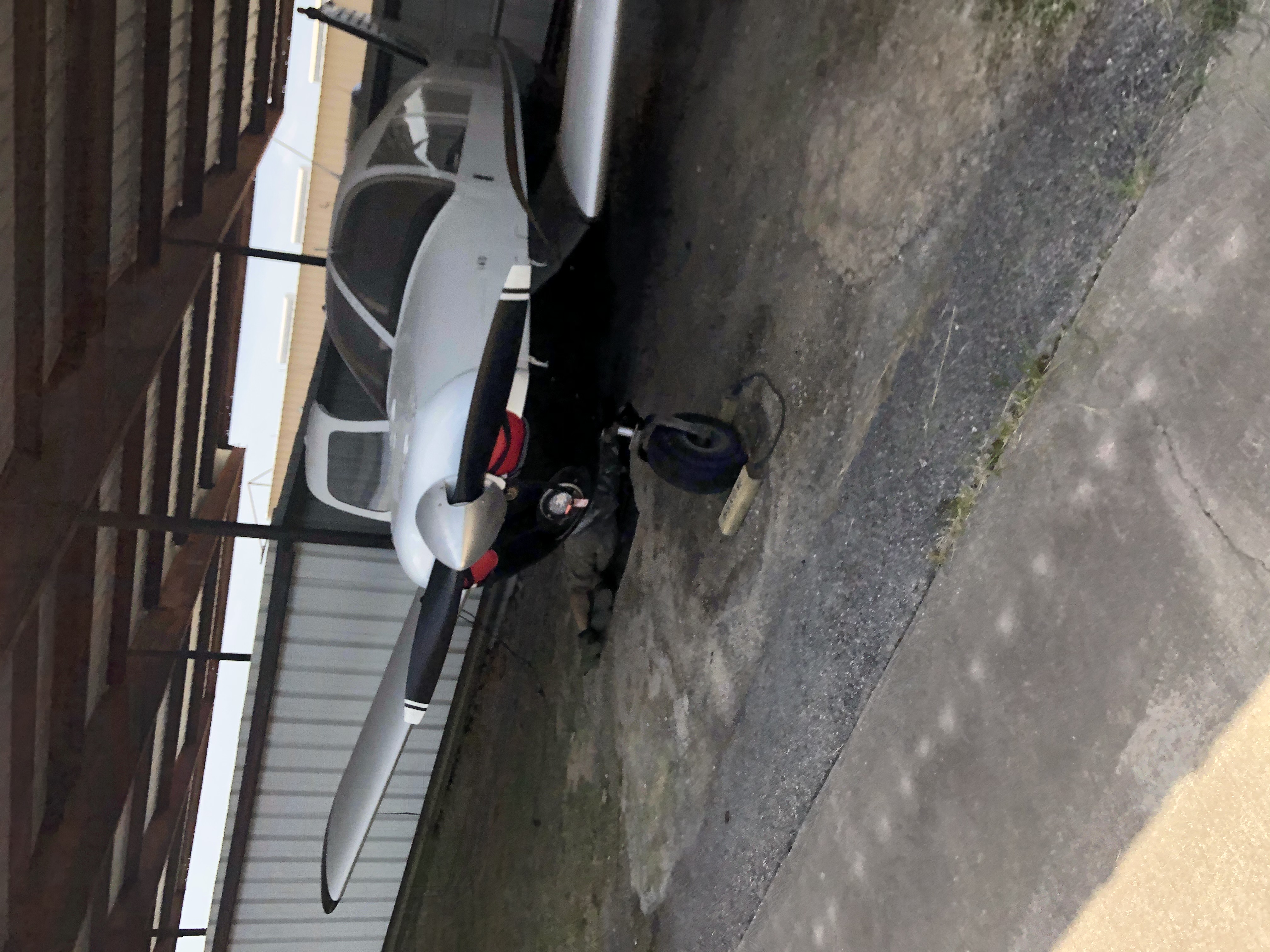 Mechanic inspecting the Cherokee before the crash