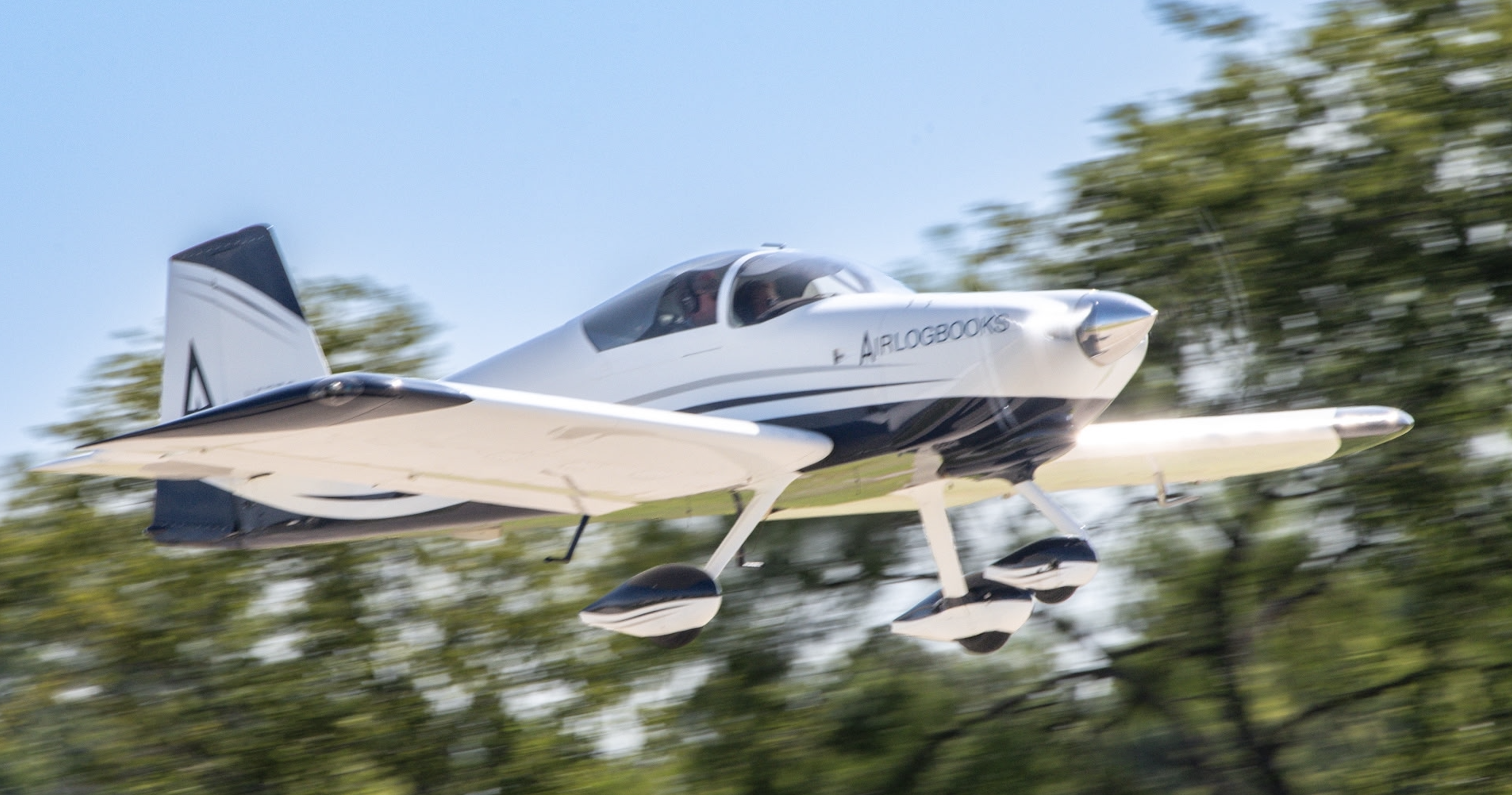 AirLogbooks-branded aircraft in flight